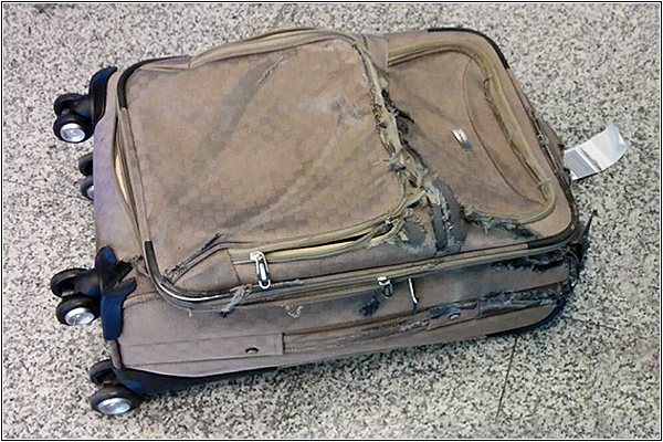 Сломанный чемодан